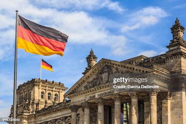 facade of bundestag, reichstag, regierungsviertel, berlin, germany - berlin regierungsviertel stock pictures, royalty-free photos & images