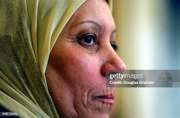 Sabria Naama talks with the media in the House Rules Committee meeting room in the U.S. Capitol about her personal storys of suffering under the...