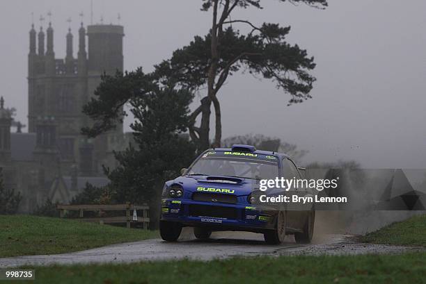 Richard Burns of England and Subaru speeds past Margam House during the second day of the Network Q Rally of Great Britain in Cardiff, Wales. DIGITAL...