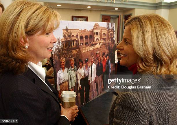 Marsha Blackburn, R-Tenn., and Ileana Ros-Lehtinen, R-Fla., talk before the start of the news conference on the recently returned all-female...