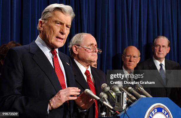 John Warner, R-Va., chairman, Armed Services Committee, Carl Levin, D-Mich., Pat Roberts, R-KS., and John D. Rockefeller, D-WV., during a news...