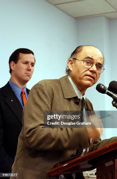 Kanan Makiya of the Iraqi National Congress and Rick Santorum, R-PA., during a news conference with Iraqi Americans on first-hand accounts of Saddam...