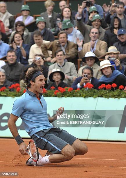 Swiss Roger Federer jubilates after winning against Swedish player Robin Soderling during their French Open tennis men's final match on June 7, 2009...