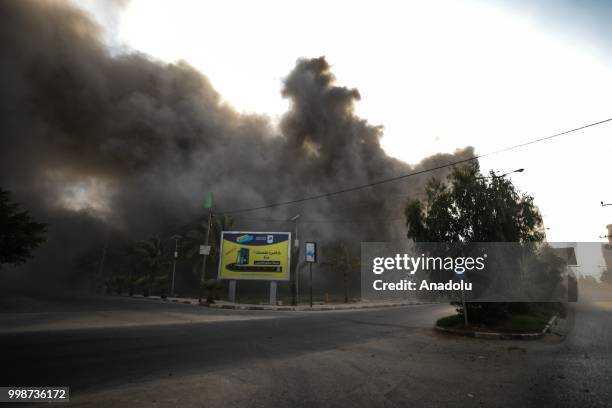 Smoke rises after Israeli fighter jets pounded Al Katiba region in Gaza City, Gaza on July 14, 2018.