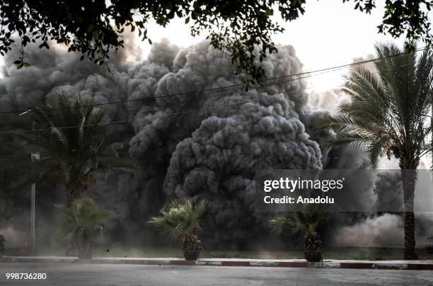 Smoke rises after Israeli fighter jets pounded Al Katiba region in Gaza City, Gaza on July 14, 2018.