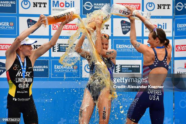 Laura Lindemann of Germany ,Cassandre Beaugrand of France and Katie Zaferes of the United States celebrate during the ITU World Triathlon Elite women...