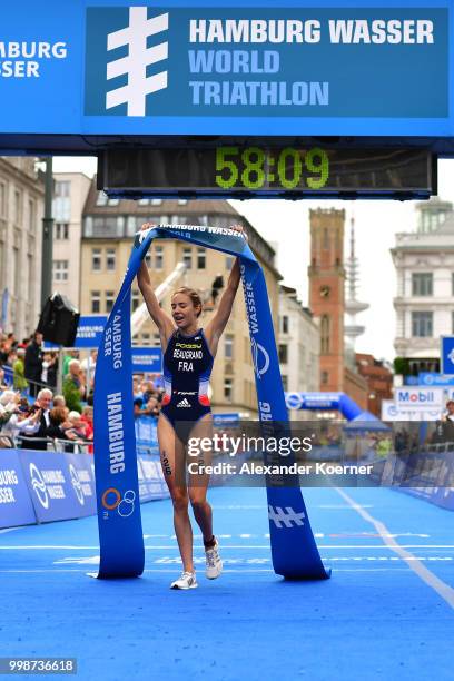 Cassandre Beaugrand of France celebrates of finishing first during the ITU World Triathlon Elite women sprint race on July 14, 2018 in Hamburg,...