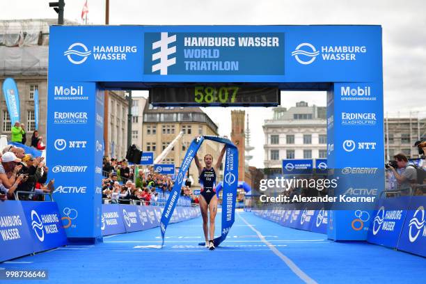 Cassandre Beaugrand of France celebrates of finishing first during the ITU World Triathlon Elite women sprint race on July 14, 2018 in Hamburg,...