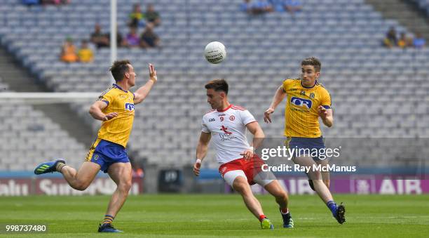 Dublin , Ireland - 14 July 2018; Pádraig Hampsey of Tyrone in action against Enda Smith, left, and Cathal Compton of Roscommon during the GAA...