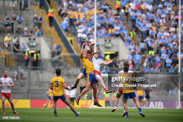 Dublin , Ireland - 14 July 2018; Ciarain Murtagh and Enda Smith of Roscommon in action against Declan McClure of Tyrone during the GAA Football...