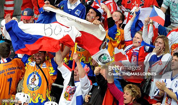 Czech's fans cheer during the IIHF Ice Hockey World Championship match Canada vs Czech Republic in the southern German city of Mannheim on May 18,...