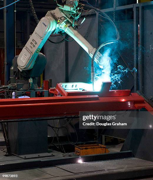 Robotic welder at JWF Defense Systems in Johnstown Pennsylvania. JWF Defense Systems is a small business located in Johnstown, Penn. JWFDS provides...