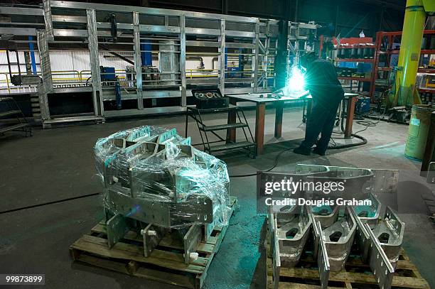 Worker TIG welds parts for the Stryker vehicle at JWF Defense Systems in Johnstown Pennsylvania. JWF Defense Systems is a small business located in...