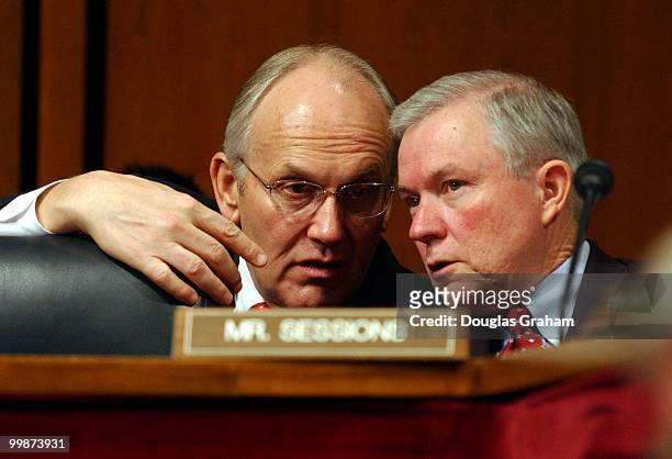 Larry Craig, R-ID., and Jeff Sessions, R-Al., talk during the Senate Judiciary Committee, full committee hearing on the nomination of Janice Brown to...
