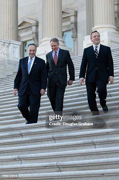 Charles Schumer, D-N.Y., Senate Minority Leader Harry Reid, D-Nev., and Senate Minority Whip Richard Durbin, D-Ill., heads to a news conference to...