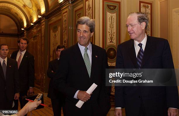 John Kerry, D-MASS. And John D. Rockefeller, D-WV., talk in the hallway of the U.S. Capitol after a meeting with Robert C. Byrd, D-WV.