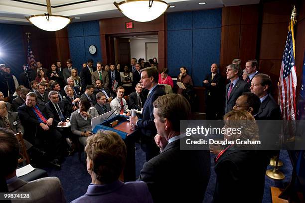 Mark Warner, D-VA., and eleven other freshmen senator during a press conference with the other freshman Democrats to introduce a package of...