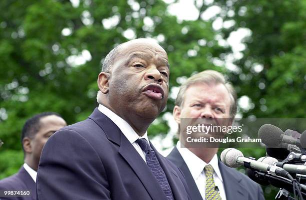 John Lewis, D-Ga., and Tony Hall, D-Ohio, during a press conference to announce legislation to put Congress on record as apologizing for its role in...