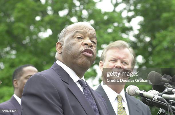 John Lewis, D-Ga., and Tony Hall, D-Ohio, during a press conference to announce legislation to put Congress on record as apologizing for its role in...