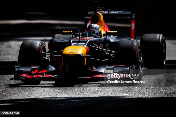 Patrick Friesacher of Austria drives the Red Bull Racing RB8 during the Goodwood Festival of Speed at Goodwood on July 14, 2018 in Chichester,...