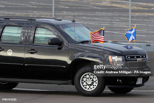 Presidential car flies the Saltire alongside the US flag as it waits for the arrival of US President Donald Trump and his wife, Melania, at Prestwick...
