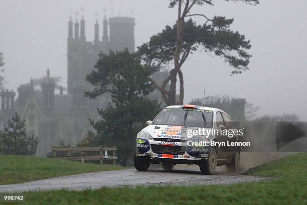 Carlos Sainz of Spain and Ford speeds past Margam House during the second day of the Network Q Rally of Great Britain in Cardiff, Wales. DIGITAL...