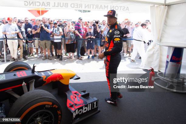 Patrick Friesacher of Austria prepares to drive the Red Bull Racing RB8 during the Goodwood Festival of Speed at Goodwood on July 14, 2018 in...