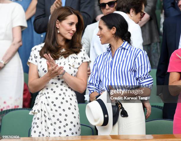 Catherine, Duchess of Cambridge and Meghan, Duchess of Sussex attend day twelve of the Wimbledon Tennis Championships at the All England Lawn Tennis...