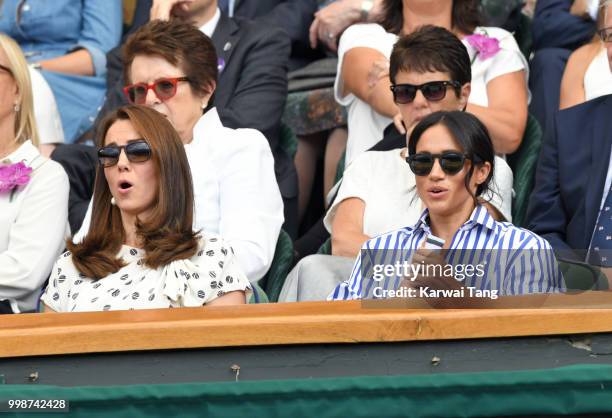 Catherine, Duchess of Cambridge and Meghan, Duchess of Sussex attend day twelve of the Wimbledon Tennis Championships at the All England Lawn Tennis...