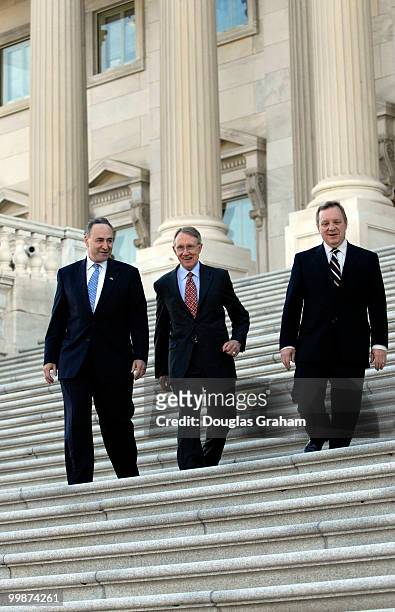 Charles Schumer, D-N.Y., Senate Minority Leader Harry Reid, D-Nev., and Senate Minority Whip Richard Durbin, D-Ill., heads to a news conference to...