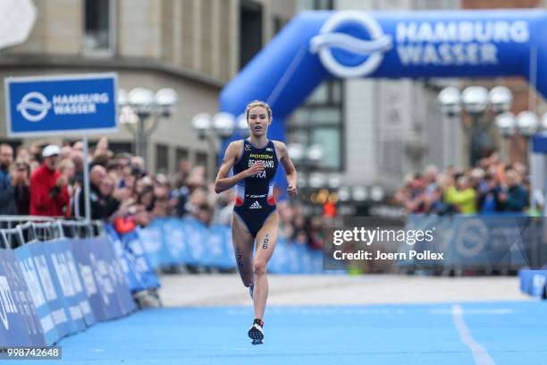 Cassandre Beaugrand of France competes in the run leg during the ITU World Triathlon Elite women sprint race on July 14, 2018 in Hamburg, Germany.