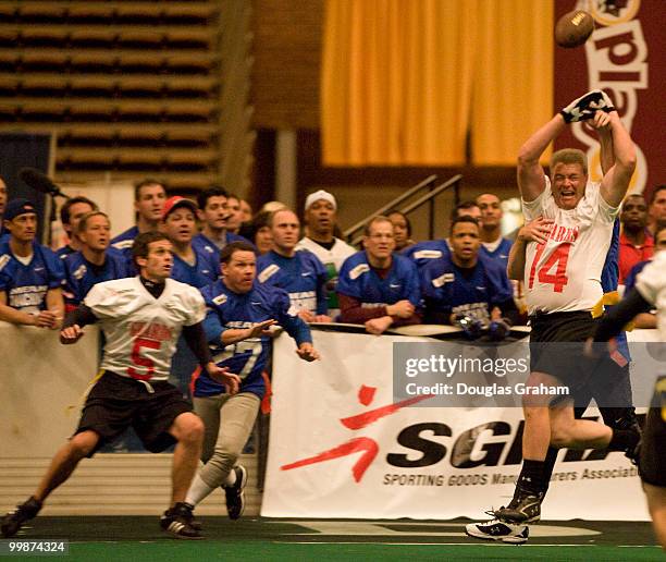 Tom Perrell has a pass misses a pass during the Roll Call Longest Yard Football Classic charity football game at the D.C. Armory on Oct. 27, 2009.