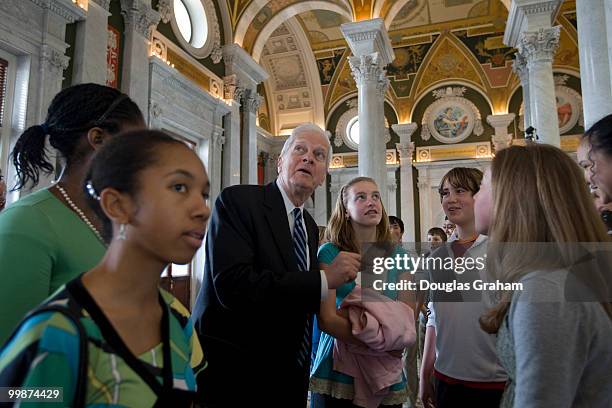Librarian of Congress James H. Billington talks with school kids during a media preview of the new LOC Experience, which will feature interactive...