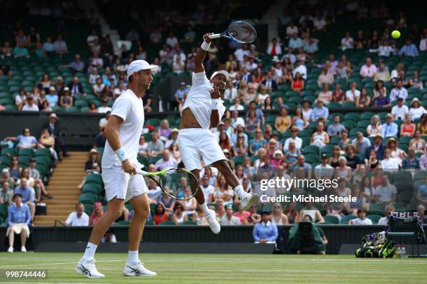 Raven Klaasen of South Africa and Michael Venus of New Zealand return against Mike Bryan and Jack Sock of The United States during the Men's Doubles...