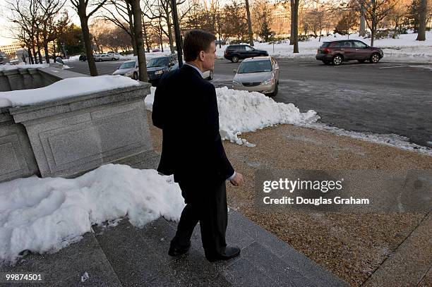 Senator Mark Warner, D-VA., leaves his office in the Russell Senate Office Building following passage of the health care reform bill on Thursday...