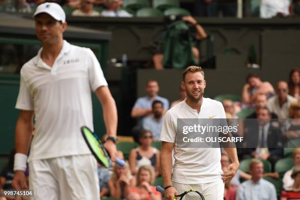 Player Mike Bryan and US player Jack Sock win a point against South Africa's Raven Klaasen and New Zealand's Michael Venus during their mens' doubles...