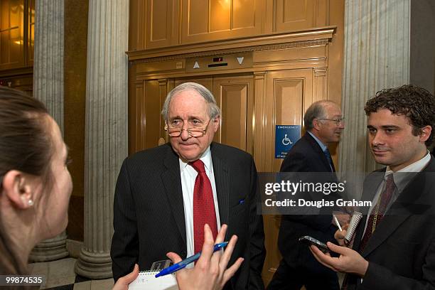 Carl Levin, D-MI., is mobbed by reporters during the Senate luncheons just outside the Senate Chamber in the U.S. Capitol, April 1, 2008.