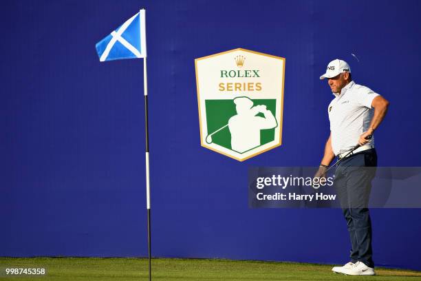 Lee Westwood of England lines up a putt on hole eighteen during day three of the Aberdeen Standard Investments Scottish Open at Gullane Golf Course...