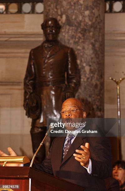 John Lewis, D-GA, makes the keynote speech in the shadow of the Robert E. Lee statue during the 40th anniversary of the March on Washington with a...
