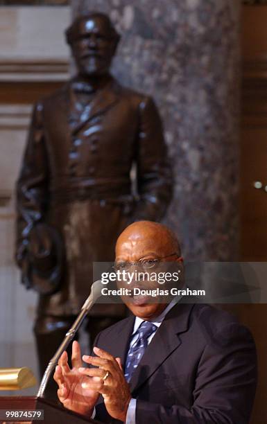 John Lewis, D-GA, makes the keynote speech in the shadow of the Robert E. Lee statue during the 40th anniversary of the March on Washington with a...