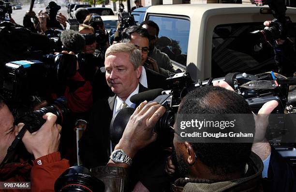 Bob Ney tries to get through the sea of photographers as he leaves the U.S. District Court October 13, 2006 in Washington, DC. Ney entered a guilty...