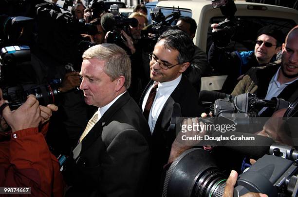 Bob Ney tries to get through the sea of photographers as he leaves the U.S. District Court October 13, 2006 in Washington, DC. Ney entered a guilty...