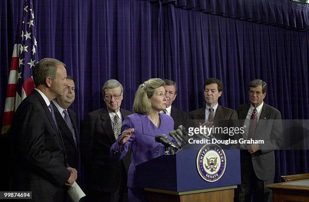 Sens. Kay Bailey Hutchison, R-Texas, during a press conference on the marriage penalty tax. L to R behind her are Don Nickles, R-Okla., Spencer...