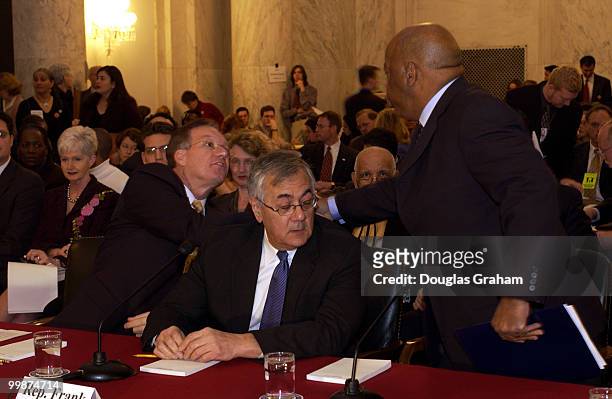 Wayne Allard, R-Colo., Barney Frank, D-Mass., and John Lewis, D-Ga., greet each other before the start of the Senate Judiciary Committee Marriage...