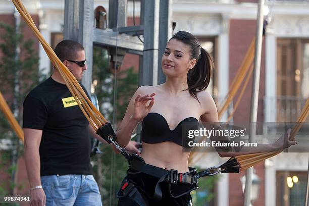 Model wearing the bra 'Perfect Strapless, designed by Wonderbra, jump on a trampoline to test the effectiveness of the new item of clothing at El...