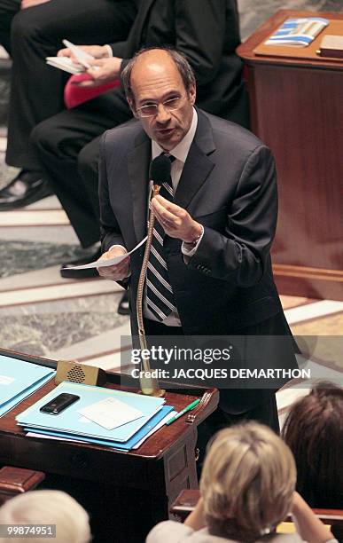 France's Minister for Labour Eric Woerth gives a speech during the weekly session of questions to the government on May 18, 2010 at the national...