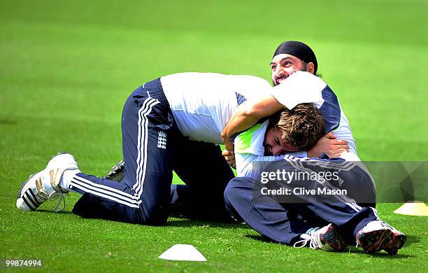 Monty Panesar and Liam Plunkett of England Lions wrestle during warm up prior to a net session at The County Ground on May 18, 2010 in Derby, England.