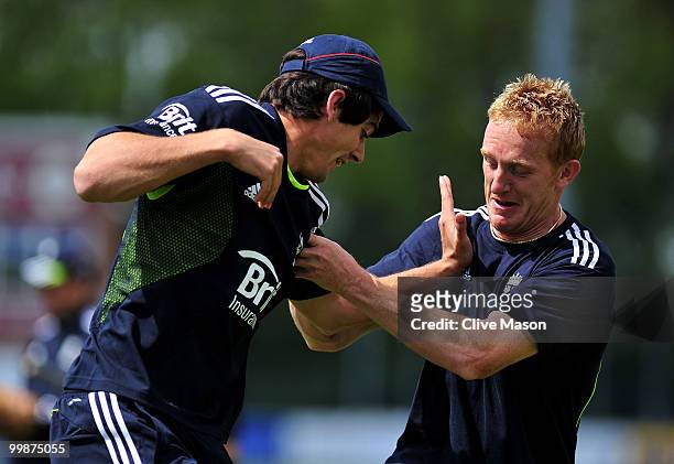 Alastair Cook and Steve Kirby of England Lions wrestle during warm up prior to a net session at The County Ground on May 18, 2010 in Derby, England.