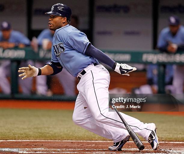 Outfielder Carl Crawford of the Tampa Bay Rays bunts against the Seattle Mariners during the game at Tropicana Field on May 16, 2010 in St....