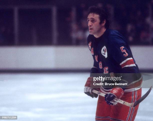 Phil Esposito of the New York Rangers skates on the ice during an NHL game against the California Golden Seals circa 1975 at the Oakland Coliseum in...